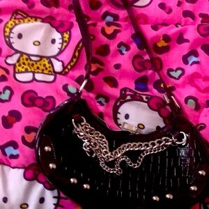 Black skin purse with silver chains